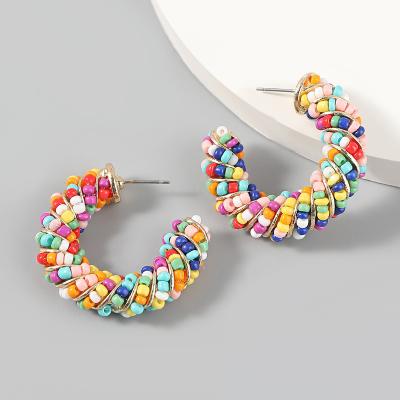 China Hot Selling Fashion Twist Alloy C Shape Circle Earrings For Women Party Jewelry Rice Pearl Earrings 2021 for sale