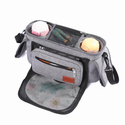 China Water Resistant Large Capacity Waterproof Stroller Hanging Bag Diapers Bottles Organizer Bag Multi Pocket Storage Bag for sale