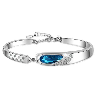 China Trendy Women's Fashion Charm Bracelets Sea-blue Heart Of Ocean Zirconia Tension Setting Lady Crystal Shiny Bracelet Jewelry For for sale