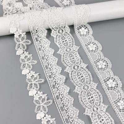 China Beautiful Fancy 3D African French Embroidered Bridal Lace Fabric For Wedding for sale