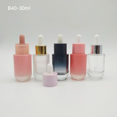 China Pink Personal Care Dropper Bottles Skin Care Packaging Essential Oil Bottle for sale