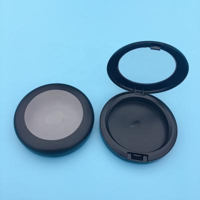 China Recyclable Stock Pan Size D59MM Matte Black Compact Powder Case Empty Plan Around Single Color Eyeshadow Palette Tube Container With Window for sale