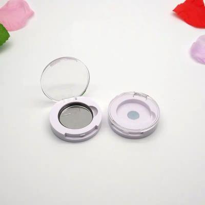 China Recyclable Simple White Color Round Small Empty Eyeshadow Container Compact Stock Powder Case for sale