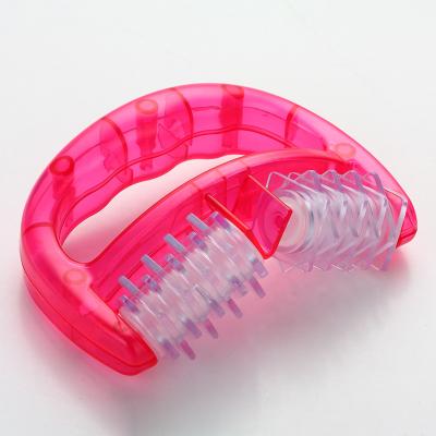 China Hand Held Cellulite Massager Brush Body Roller Plastic Handheld Massager for sale