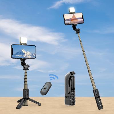 China Mini Portable Universal Handheld Gimbal Folding Automatic Stabilizer Tripod 360 Rotation Selfie Stick with Fill Light 3 Colors for sale