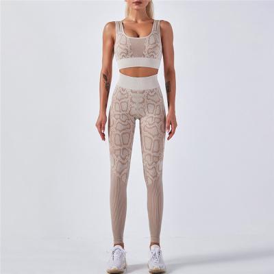 China Breathable Gym Wear Women Summer Split Two Piece Set Jogging Tight Snake Printing Butt Lifter Yoga Set for sale