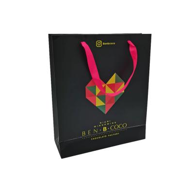 China Recycled Paper Bag Logo Printed Cardboard Tote Bag Reusable Materials Custom Retail Luxury Shopping for sale