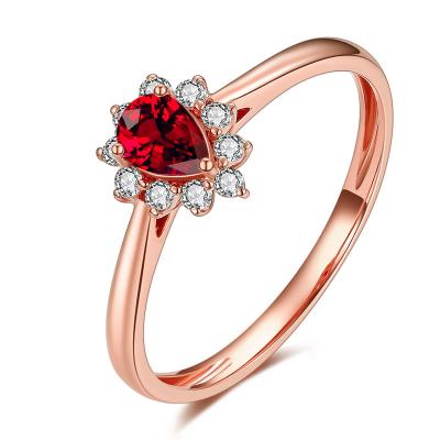 Chine Anneau de mariage en pierre rouge, anneau rouge véritable avec des diamants autour de lui à vendre