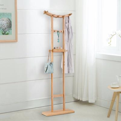 China Sustainable Bamboo Clothes Hanger Portable Coat Rack Hat Umbrella Hanger Bamboo Hanger for sale