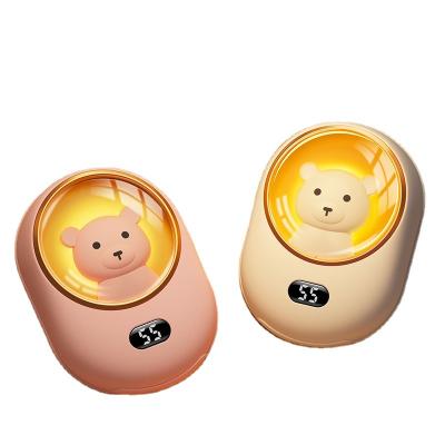 China Portable Rechargeable Hand Warmer Customize Mini Hand Warmer Reusable 5000mA Electric Portable Rechargeable Hand Warmer Gift Mobile USB Power Bank for sale