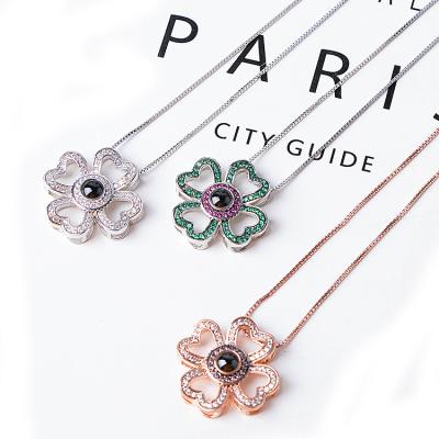 China 100 Tongue Projection Necklace Pendant Four Leaf Clover Romantic Pendant I Love You With 3D Stone For Women Jewelry for sale