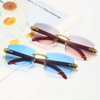 China New Retro Stylish Fashion Sunglasses Square Rimless Diamond Custom Sunglasses for sale