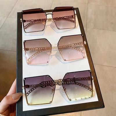 China Oversized Rimless Sunglasses 2022 Luxury Square Women Fashion Sun Glasses for sale