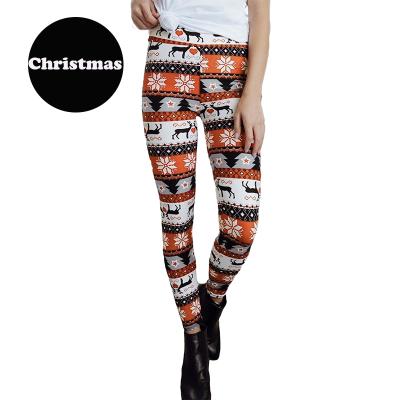 China 2021 Cartoon Ugly Printing Reindeer Tree High Waist Fashion Festival Women Christmas Breathable Leggings for sale