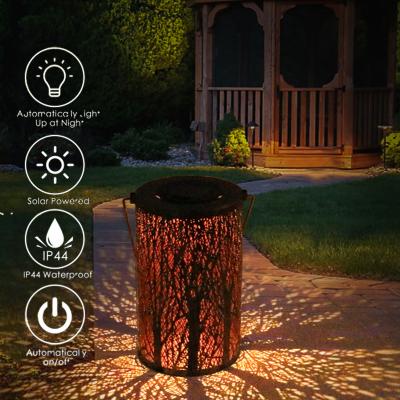 China Solar Charging Solar Garden Lights For Garden Waterproof Metal Cavity Projection Lanterns Solar Patio Yard Hanging for sale