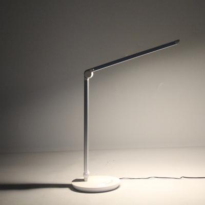 China Dimest Modern Multifunctional Eye Table Desk Lamp White Touch Switch Led Modern Light Rechargeable Desk Table Lamp for sale