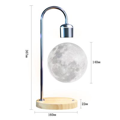 China Bedside Modern Nordic Home Study Bedroom Hotel Bar Decor Table Desk Lamp Magnetic Floating Wireless Charger for sale