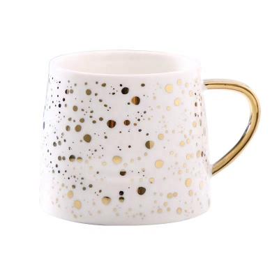 China Disposable Creative Nordic Star Water Ceramic Home Milk Juice Beer Pottery Cup Coffee Mug With Gold Handle for sale