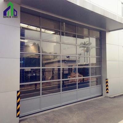 China JIANDA Industrial Glass Sectional Overhead Door For Car 4s Shop for sale