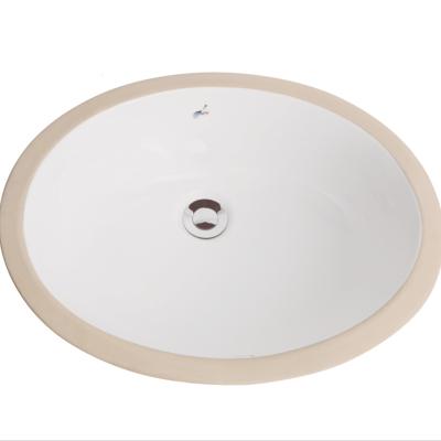 China Modern White Oval Porcelain Basin Ceramic Undermount Bathroom Sink for sale