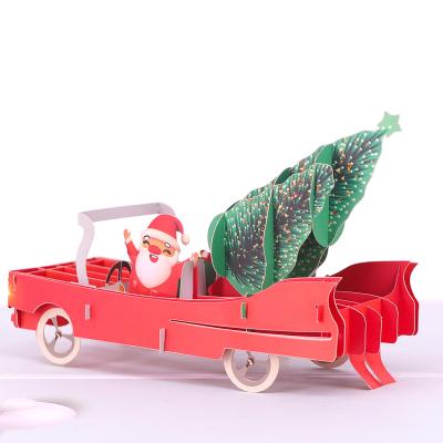 China Custom Funny 3d Europe Santa Claus And Tree Pop Merry Christmas Gift Greeting Cards for sale