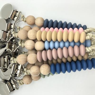 China Baby Free Wholesale Chewable Wooden Beaded Dummy Silicone Soother Soother Holder Chain Clip for sale