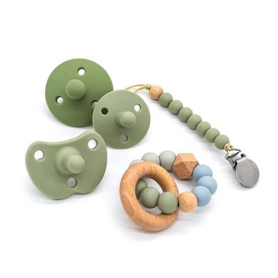 China Ruber Free Natural Silicone Soothie Pacifier BPA Conductive Baby Bibs Dummy Nipples For Baby for sale