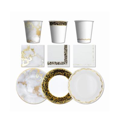 China Gold stamping 2023 gold stamping party paper plates and wholesale black and white cups and napkins sets disposable paper tableware sets for sale