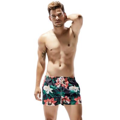 China Anti-Wrinkle Men's Breathable Swim Trunks Pants Swimwear Shorts Thin Wear Briefs Flowers Print Beachwear Swimwear Panel Shorts Swimwear - B for sale