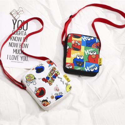 China Feminine Funny Cute Girl Messenger Bag Graffiti Canvas Small Shoulder Wide Band Square Bag for sale