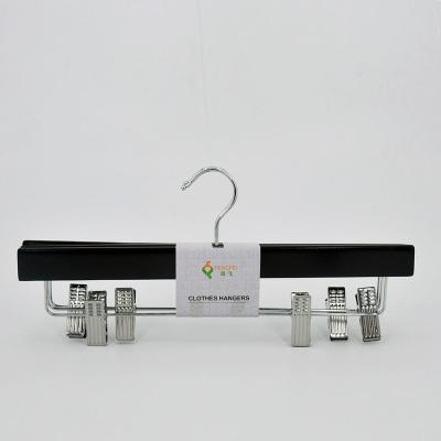 China Factory direct minimalist black color special wooden pants hangers à venda