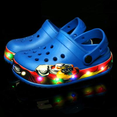 China New Design EVA Summer Beach Sandals Kids Cartoon EVA Children Led Garden Light Hoggers Garden Hoggers Eva Kids Shoes for sale