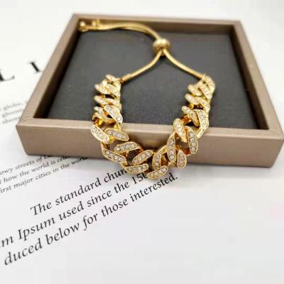 China 2021 Hot Selling CLASSIC Alloy 14K Gold Cuban Initial Crystal Bracelet Adjustable Snake Bone Galvanized Chain Bracelet for sale