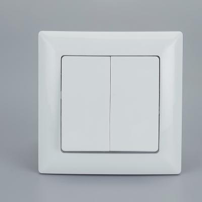 China good quality modern type PC wall light switch 2 strip 1 way 2 way anti-fire plastic key ABS plastic key for sale