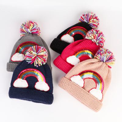 China COMMON Fashion Knitted keep warm hat for kids and boys girls rainbow embroidery winter hats knit beanie with pompom ball for sale