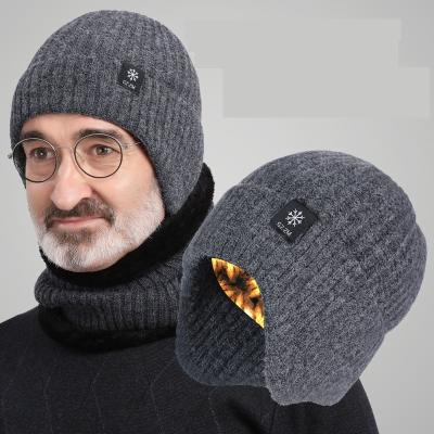 China Common Men Women Knitted Earflaps Winter Hat Caps And Scarf Magic Screen Touched Gloves And Hat Set for sale