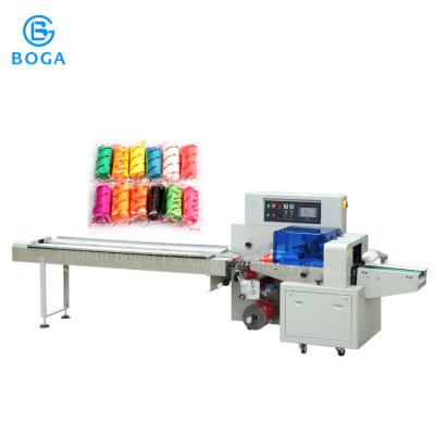 China Automatic Down paper Pillow Packing Machine with OPP&PE film material Packaging Machine for sale