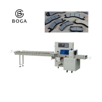 China Automatic Flow Packaging Machine Car Brake Pad Sealing 220 Volt 50 60Hz for sale