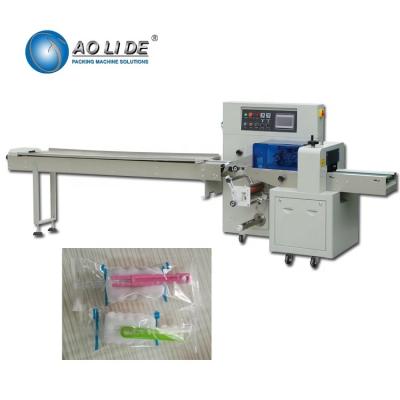 China Makeup Body Hair Cup Shoes Brush Flow Packaging Machine for sale