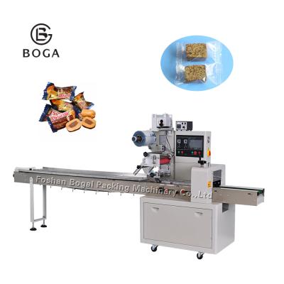 China Pillow Pouch Packaging Machine For Cookies Milk Candy Sugar Toast Bread Ice Popsicle for sale