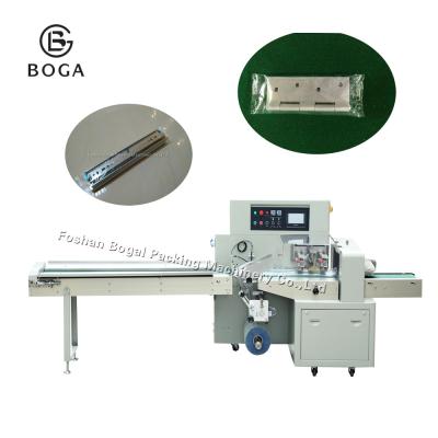 China Automatic door hinges packing machine spare parts packing machine in lahore pakistan flow wrapping machine for sale