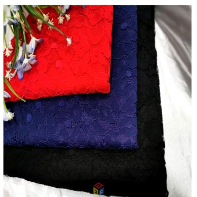 China Medium Eyelash Lace New Environmental Protection Weight Designs Redlace Fabric For Wedding Dresses for sale