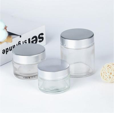 China Luxury Personal Care Cosmetic Frosted Cosmetic Jar Glass Bottle Set for sale