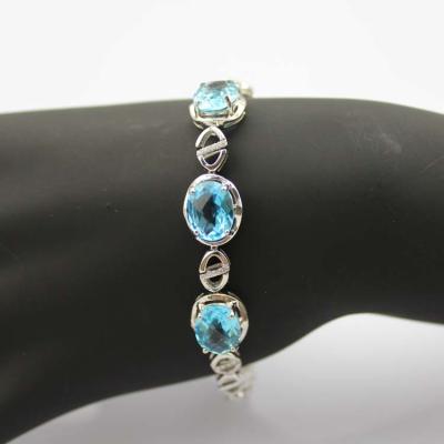 China Fashion Jewelry Oval Blue Topaz and Clear Cubic Zircon Link Bracelet(H06) for sale