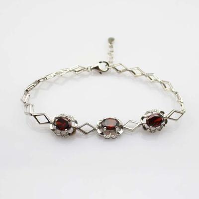 China Sterling Silver 6x8mm Created Garnet and Clear Cubic Zircon Link Tennis Bracelet (H012) for sale