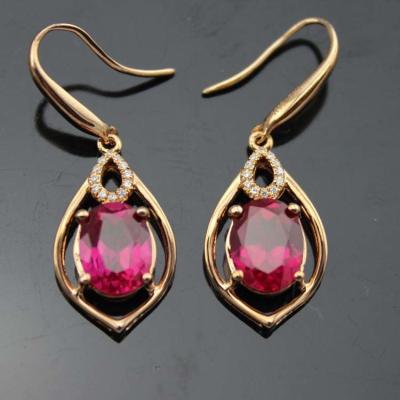 China Rose Gold 925 Silver 7mmx9mm Oval Ruby  Cubic Zirconia Dangle Drop Earrings (PSJ04225) for sale