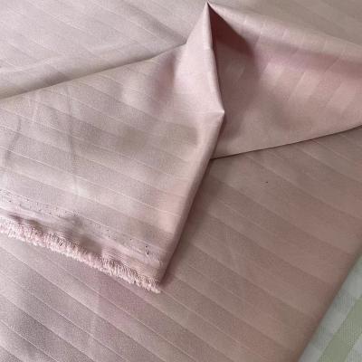 China Microfiber Waterproof Material Woven Fabric Luxury Embossed Stripe Sheet Fabric for sale