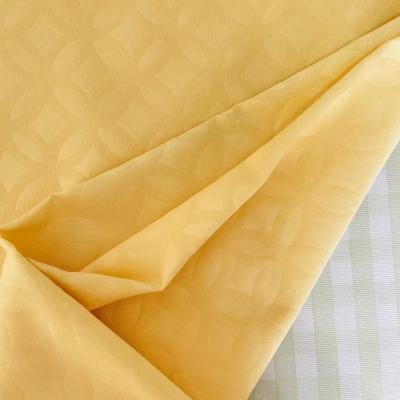 China Waterproof 100% Polyester Brushed Embossed Solid Yarn Dyed Woven Fabric for sale