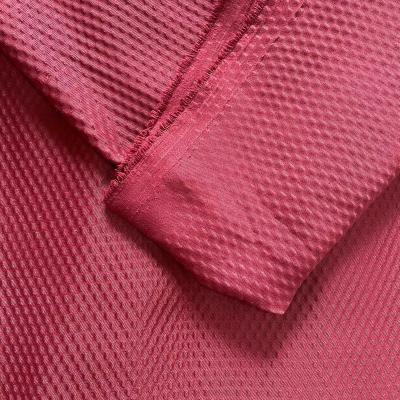 China Waterproof Home Textile Material Pure Color Dyed 100% Polyester Microfiber Bubble Emboss Fabrics For Bed Sheet for sale