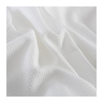 China 230 gsm waffle fabric polyester brave man organic polyester shirt weaving fabric for clothing for sale